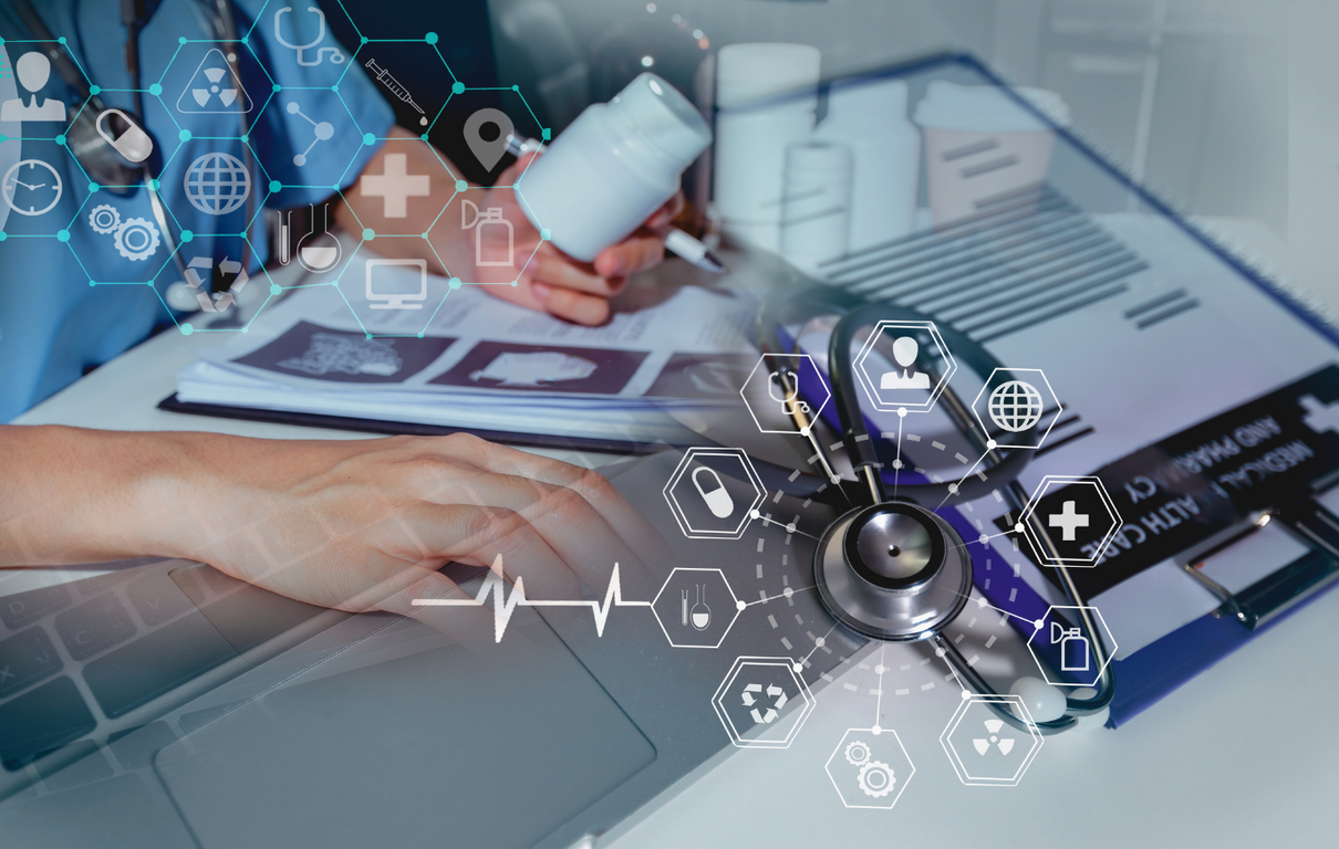 A doctor works on a laptop with a stethoscope, medical charts, and a pill bottle, with digital icons representing healthcare concepts.